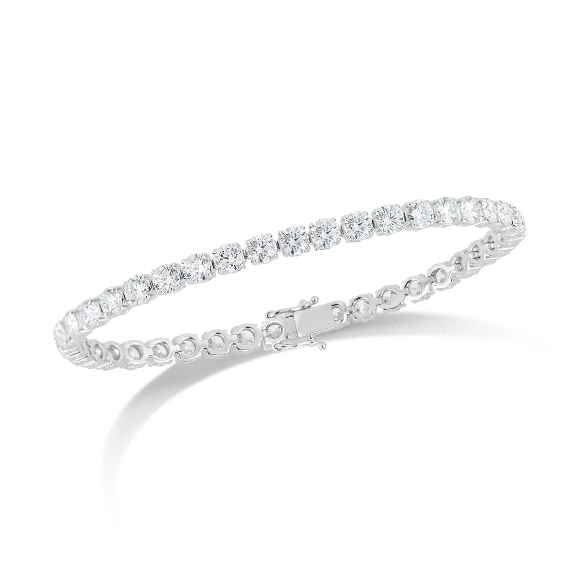 10 ct Diamond Tennis Bracelet - 18K gold weighing 14.28 grams  - 41 round diamonds totaling 10.20 carats (GIA-graded F-G color, VS2-SI1 clarity)  -152 round diamonds totaling 0.49 carats