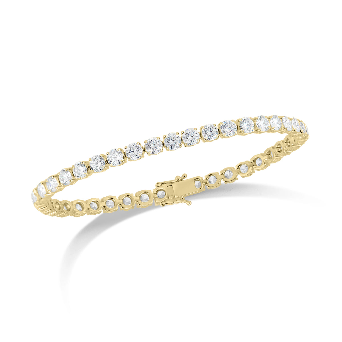 10 ct Diamond Tennis Bracelet - 18K gold weighing 14.28 grams  - 41 round diamonds totaling 10.20 carats (GIA-graded F-G color, VS2-SI1 clarity)  -152 round diamonds totaling 0.49 carats
