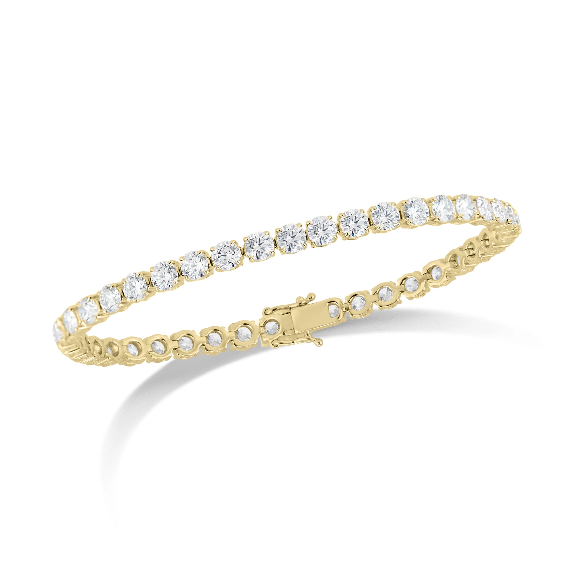 10 ct Diamond Tennis Bracelet - 18K gold weighing 14.28 grams  - 41 round diamonds totaling 10.20 carats (GIA-graded F-G color, VS2-SI1 clarity)  -152 round diamonds totaling 0.49 carats