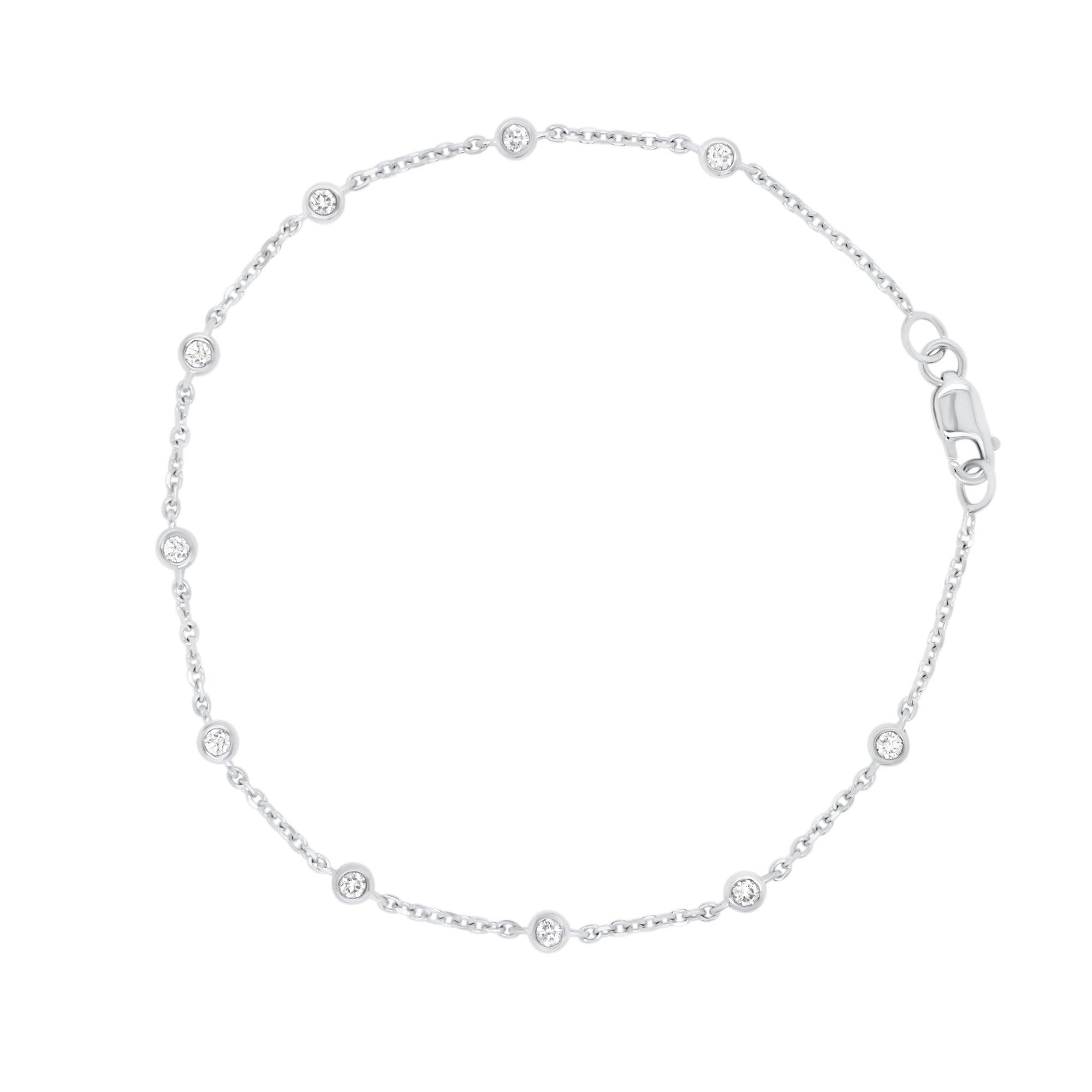 Diamonds by the Yard 10-Stone Bracelet - 18K white gold weighing 2.11 grams - 10 round diamonds totaling 0.28 carats