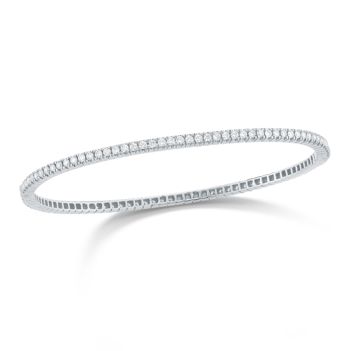 Diamond Eternity Bangle Bracelet  -14K gold weighing 10 grams  -94 shared prong-set round diamonds totaling 1.50 carats