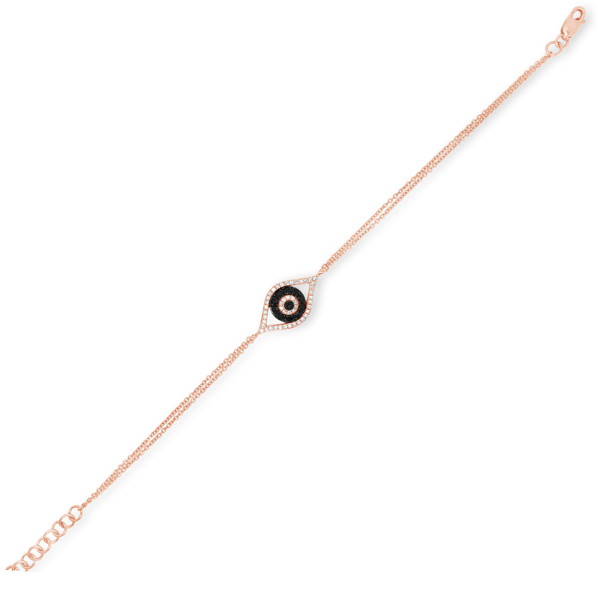 Diamond & Sapphire Evil Eye Bracelet -14K rose gold weighing 2.32 grams -46 round diamonds totaling 0.11 carats -11 sapphires totaling 0.35 carats