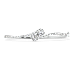 Diamond Cushion Bypass Bangle Bracelet - 18K white gold weighing 12.78 grams - 64 round diamonds totaling 1.14 carats