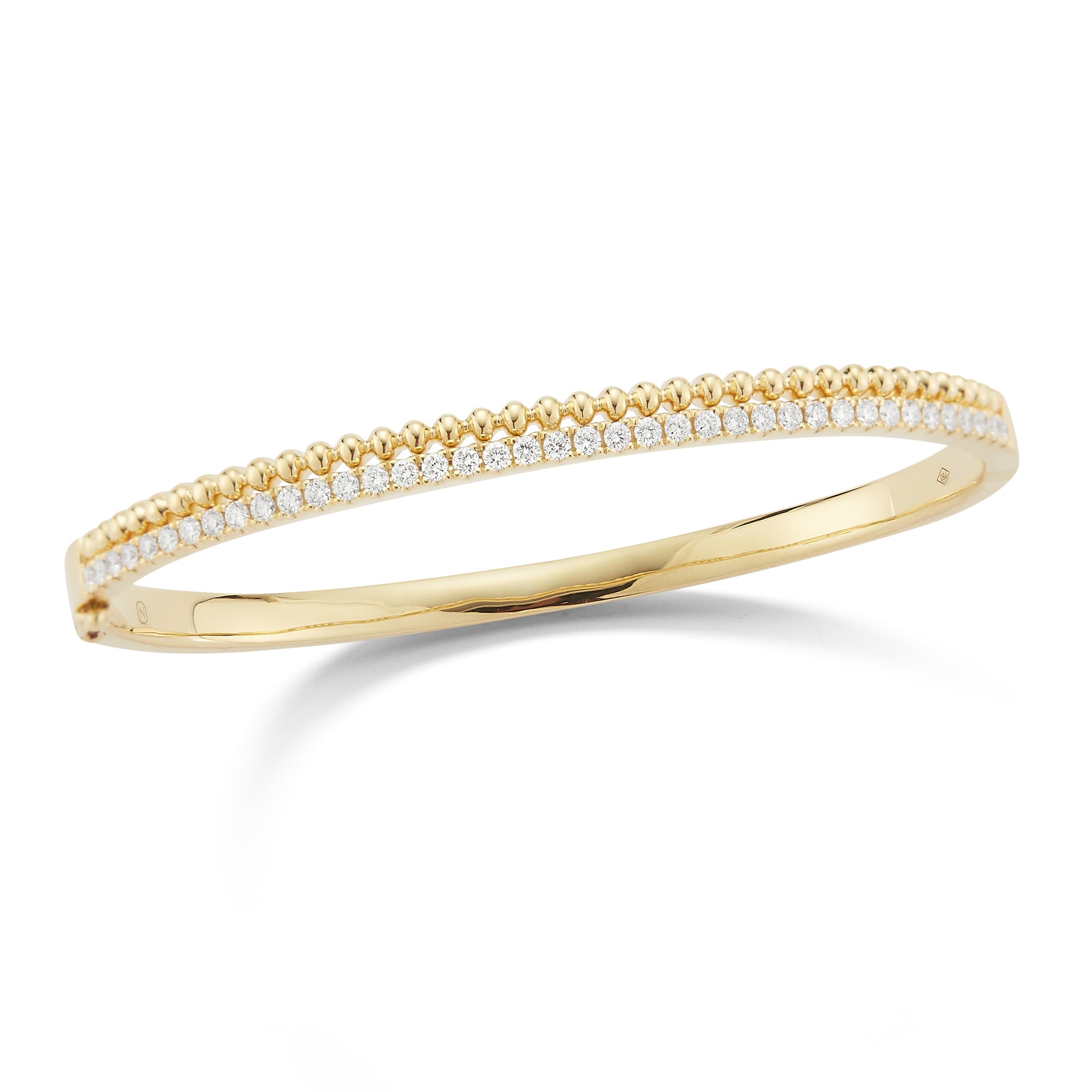 Diamond & Beaded Gold Bangle Bracelet  -18K gold weighing 20.57 grams  -39 round diamonds totaling 0.79 carats