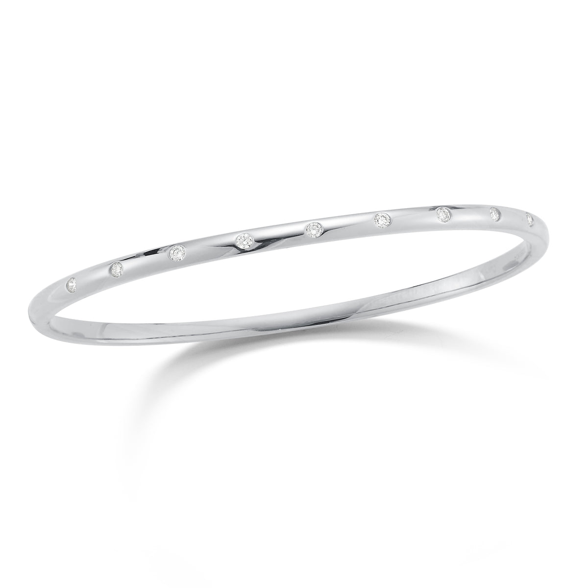 Diamond simple bangle bracelet -14K gold weighing 10.13 grams  -9 round diamonds totaling 0.26 carats.  - 3mm wide.