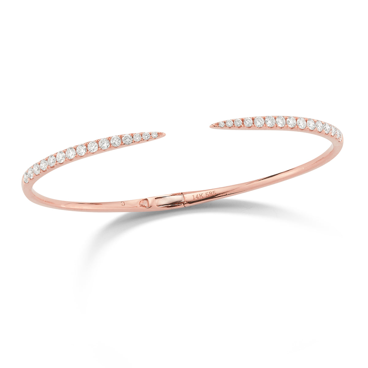 Diamond Claw Cuff Bracelet  -14K gold weighing 6.91 grams  -30 round prong-set diamonds weighing 1.09 carats.