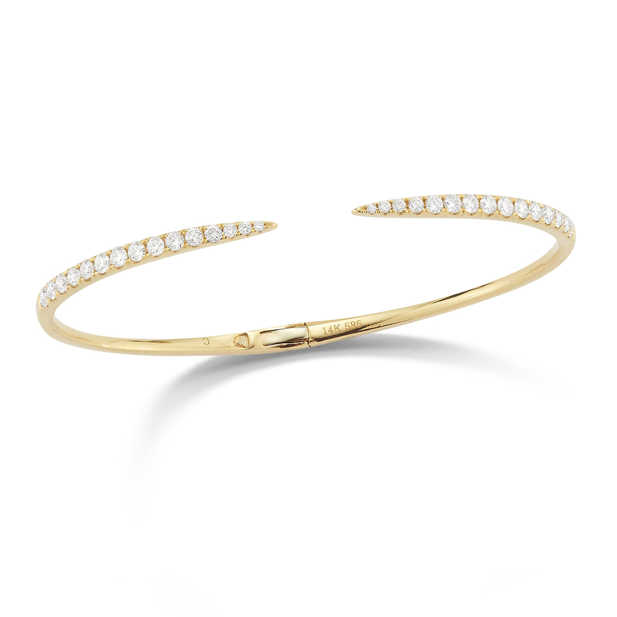 Diamond Claw Cuff Bracelet  -14K gold weighing 6.91 grams  -30 round prong-set diamonds weighing 1.09 carats.
