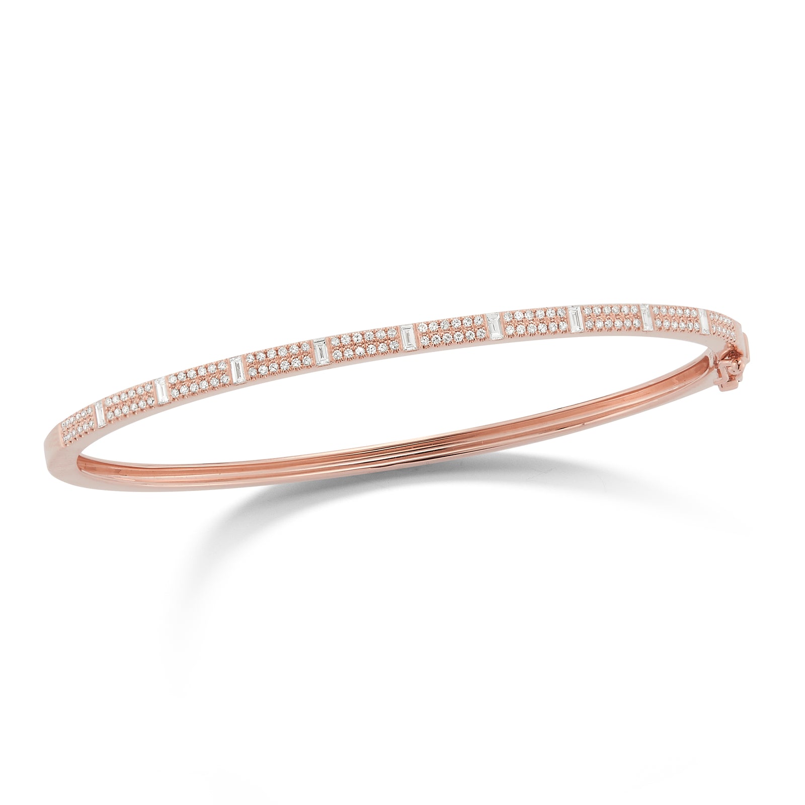 Round & Baguette Diamond Bangle Bracelet  -14K gold weighing 9.14 grams  -9 baguettes totaling 0.26 carats  -120 round diamonds 0.33 carats