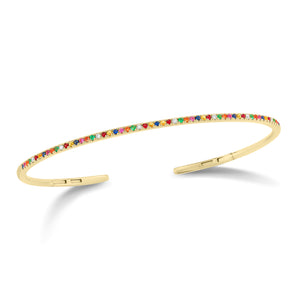 Rainbow Gemstone & Diamond Cuff Bracelet -14K gold weighing 6.48 grams -8 round pave-set diamonds totaling 0.06 carats -49 pave-set multicolor gemstones .39 carats. Size 48x58 millimeters, width 2 millimeters.