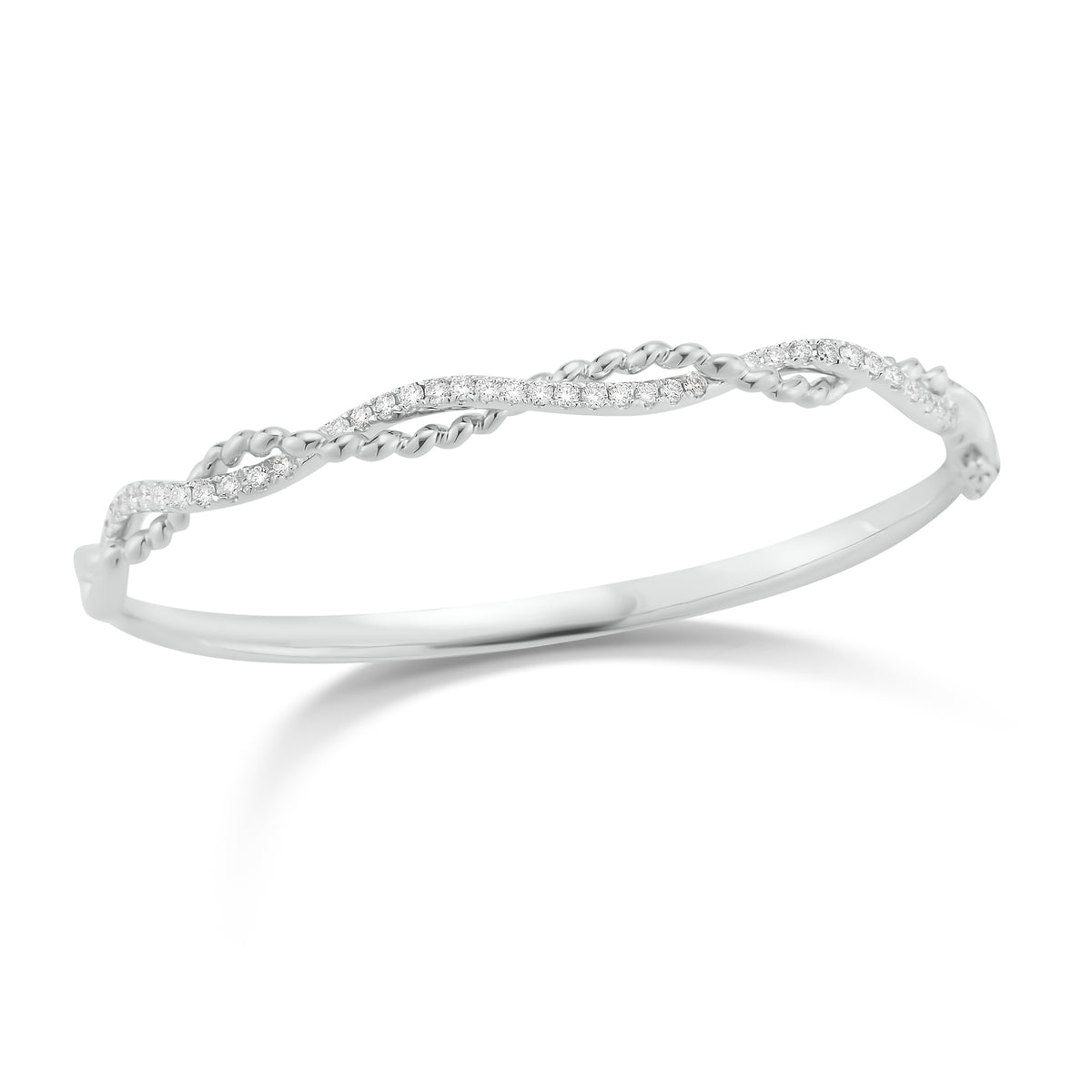 Diamond Twist Bangle Bracelet   -18K gold weighing 18.57 grams  -39 round shared prong-set diamonds totaling 0.70 carats.
