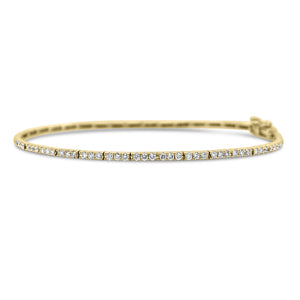 Diamond Slim Tennis Bracelet   - 14K gold weighing 3.79 grams  - 108 round diamonds totaling 1.01 carats