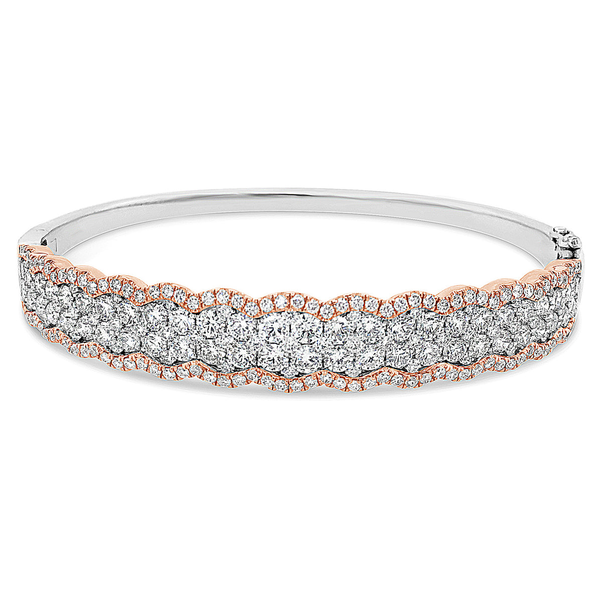 Diamond Two-Tone Bangle Bracelet -18K rose gold weighing 20.63 grams -52 round diamonds totaling 2.90 carats -157 pave diamonds totaling 1.33 carats