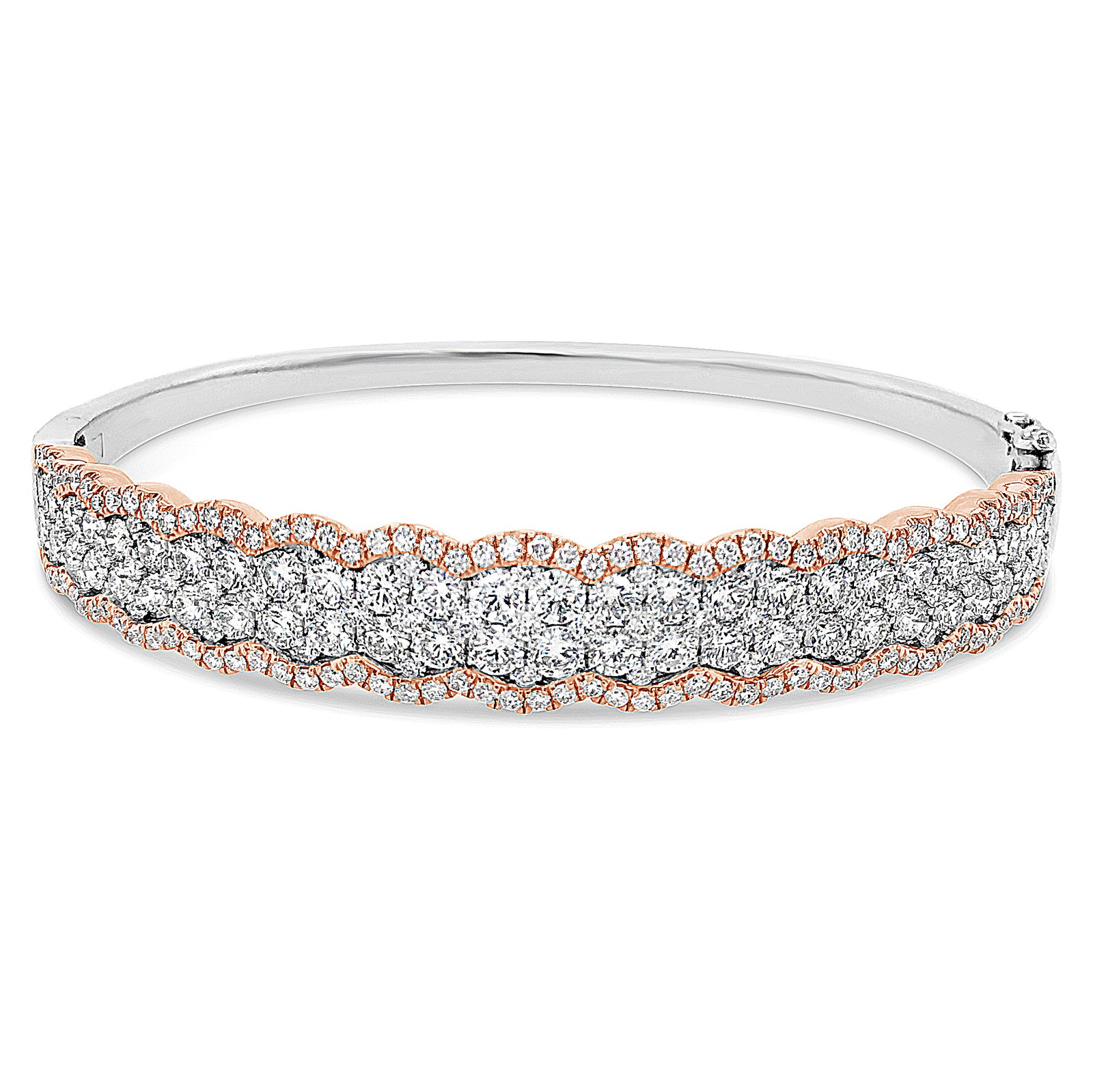 Diamond Two-Tone Bangle Bracelet -18K rose gold weighing 20.63 grams -52 round diamonds totaling 2.90 carats -157 pave diamonds totaling 1.33 carats