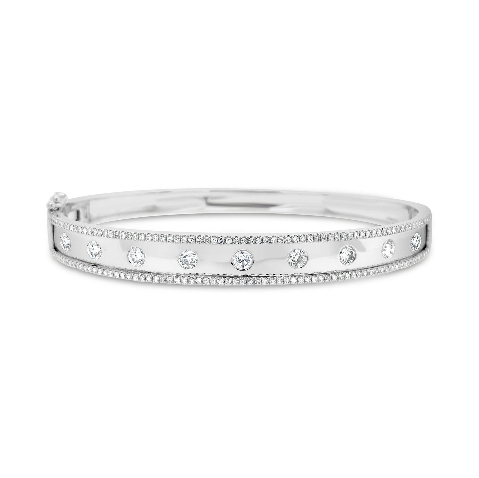 Bezel-Set & Pave Diamond Wide Bangle Bracelet -14K white gold weighing 14.45 grams -9 round bezel set diamonds totaling 0.52 carats -146 round pave set diamonds totaling 0.44 carats