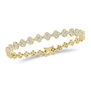 Diamond Quatrefoil Bracelet  - 18K gold weighing 12.76 grams  - 145 round diamonds totaling 3.79 carats