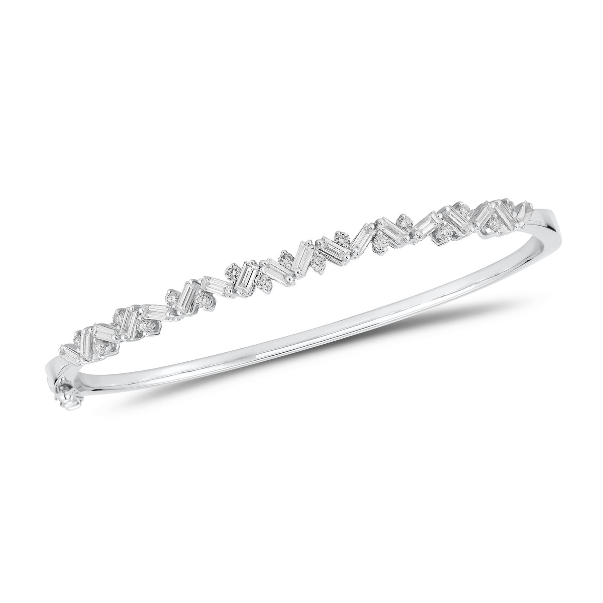 Slim Baguette and Round Diamond Bangle - 14K gold weighing 11.76 grams  - 18 slim baguettes weighing 1.04 carats  - 17 round diamonds weighing 0.37 carats