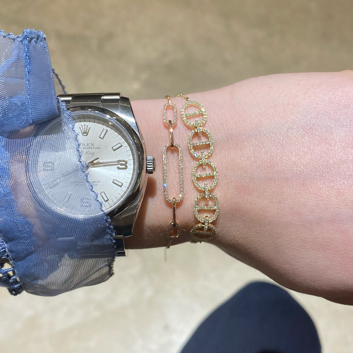 Female model wearing Diamond Adjustable Tri-Link Bracelet - 14K gold - 0.45 cts round diamonds