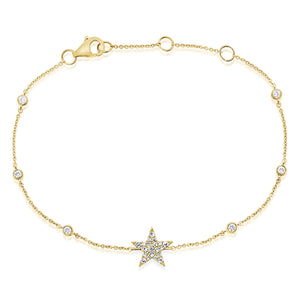 Diamond Star Bracelet with Diamond Bezels - 14K yellow gold weighing 1.39 grams - 6 round diamonds totaling 0.11 carats - 21 round diamonds totaling 0.09 carats