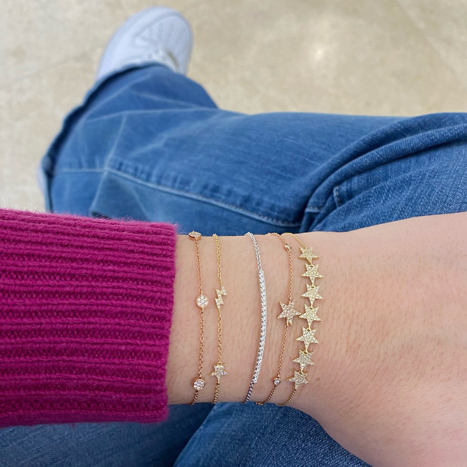 Diamond Star Bracelet with Diamond Bezels - 14K rose gold weighing 1.39 grams - 6 round diamonds totaling 0.11 carats - 21 round diamonds totaling 0.09 carats