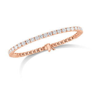 Diamond Classic Tennis Bracelet  - 14K gold weighing 13.6 grams  - 47 round diamonds totaling 8.67 carats
