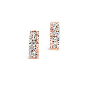 Diamond triple-row huggie earrings -18K gold weighing 2.93 grams  -68 round diamonds totaling 0.47 carats