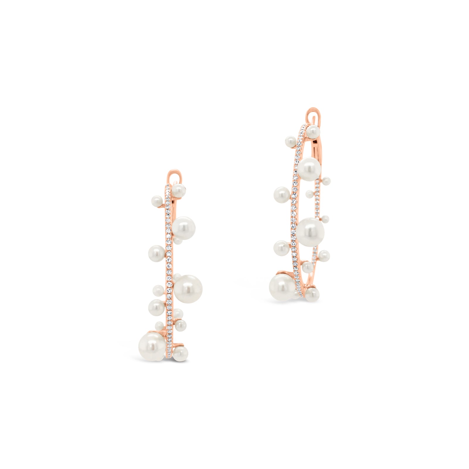 Pearl & diamond hoop earrings -14K gold weighing 8.33 grams  -146 round diamonds totaling 0.56 carats  -32 pearls