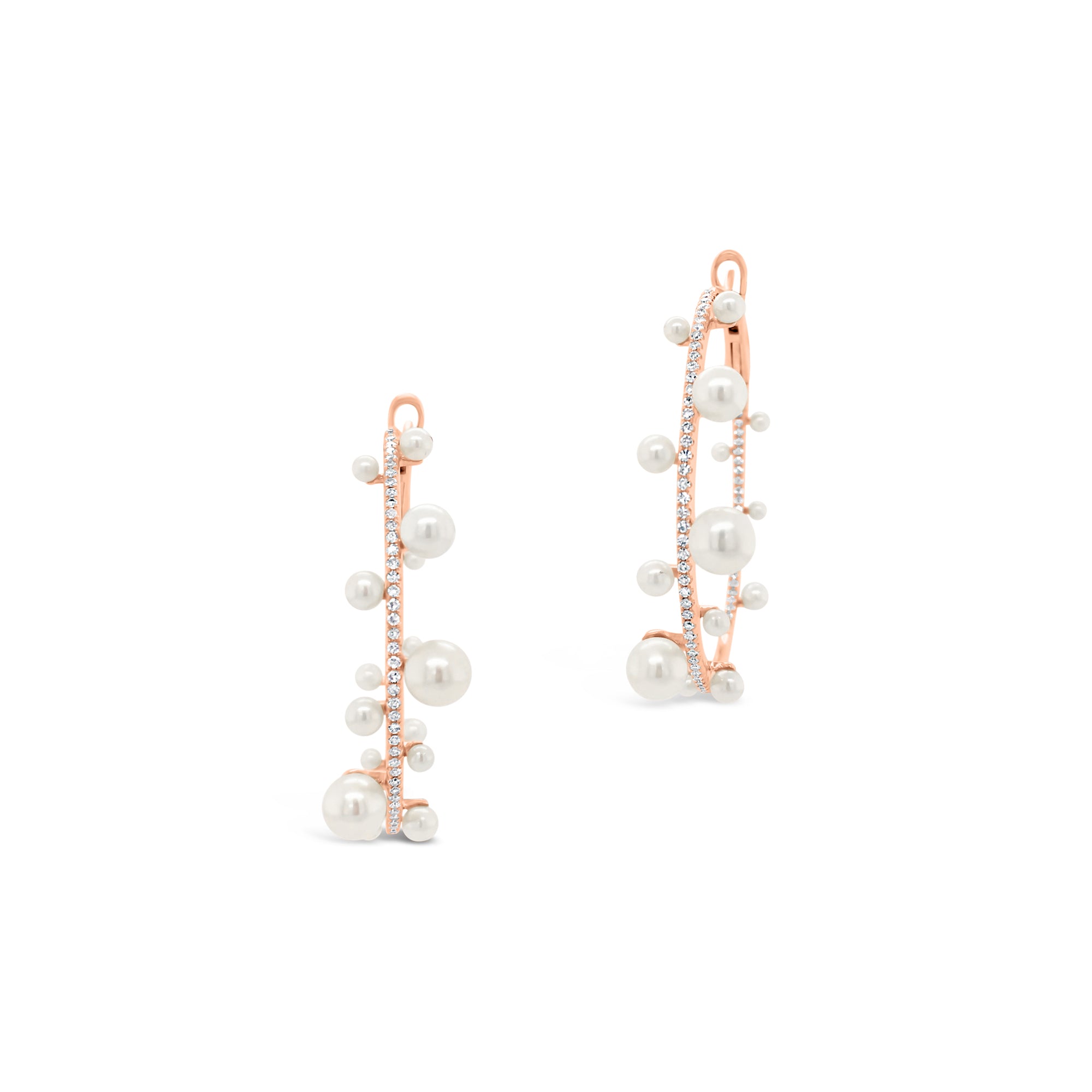 Pearl & diamond hoop earrings -14K gold weighing 8.33 grams  -146 round diamonds totaling 0.56 carats  -32 pearls
