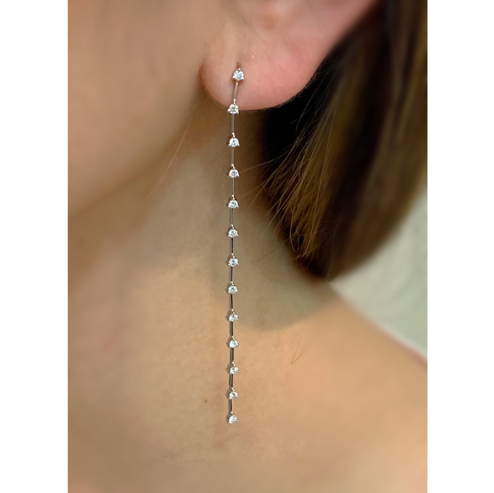 Diamond Long Linear Dangle Earrings  -14K gold weighing 3.38 grams  -26 round diamonds totaling 0.65 carats
