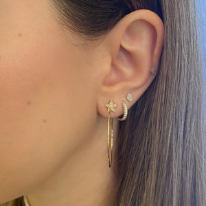 Female Model Wearing Gold Open Hoop Earrings With Diamond Stars - 14K gold weighing 3.16 grams  - 44 round diamonds weighing 0.10 carats total 