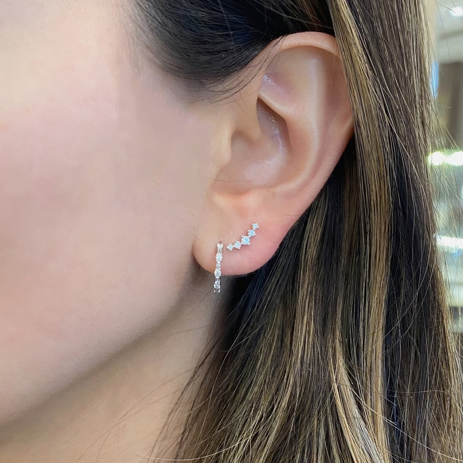 Round & Baguette Diamond Huggies - 14K white gold weighing 1.43 grams  - 8 round diamonds weighing 0.13 carats  - 8 baguette diamonds weighing 0.12 carats