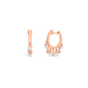 Diamond & pearl dangle huggie earrings - 14K gold weighing 2.70 grams  - 6 round diamonds totaling 0.06 carats  - 8 pearls