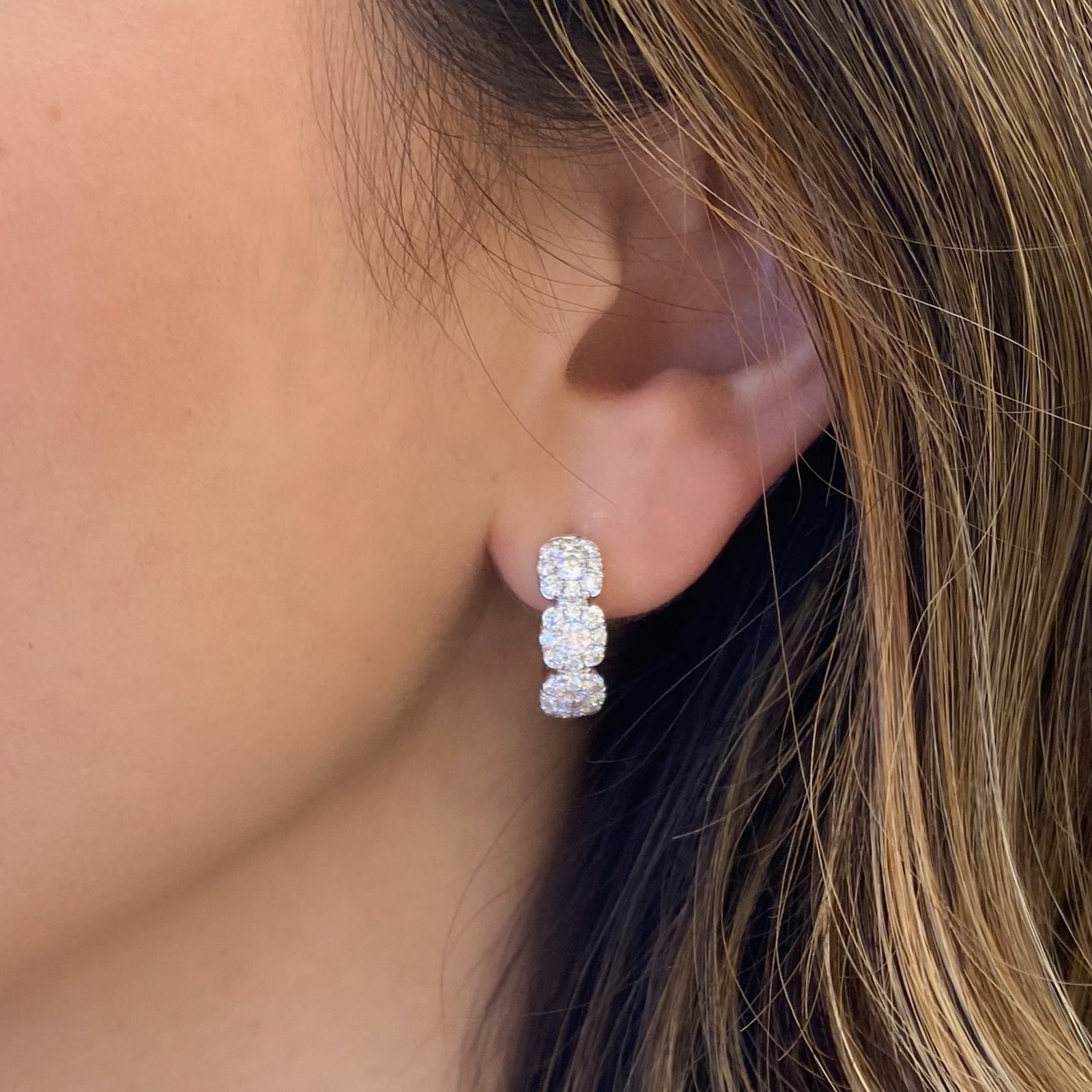 Cushion Halo Diamond Huggies - 18K gold weighing 5.57 grams  - 6 round diamonds weighing 0.65 carats  - 48 round diamonds weighing 1.05 carats