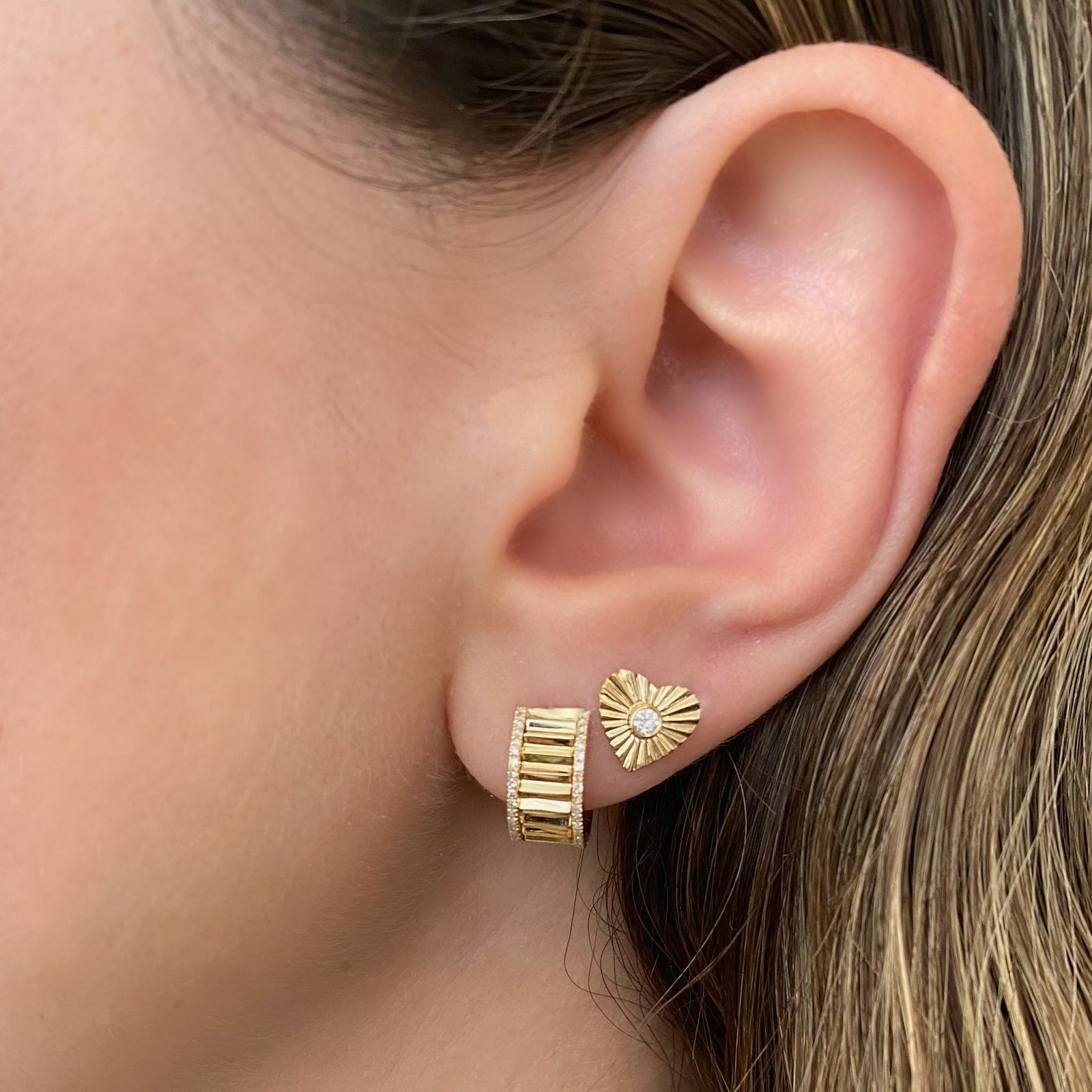 Diamond wide ridged huggie earrings - 14K gold weighing 4.45 grams  - 76 round diamonds totaling 0.16 carats