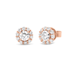 diamond halo stud earrings - 18K gold weighing 2.95 grams - 20 round diamonds totaling 0.51 carats - 2 round diamonds totaling 0.78 carats
