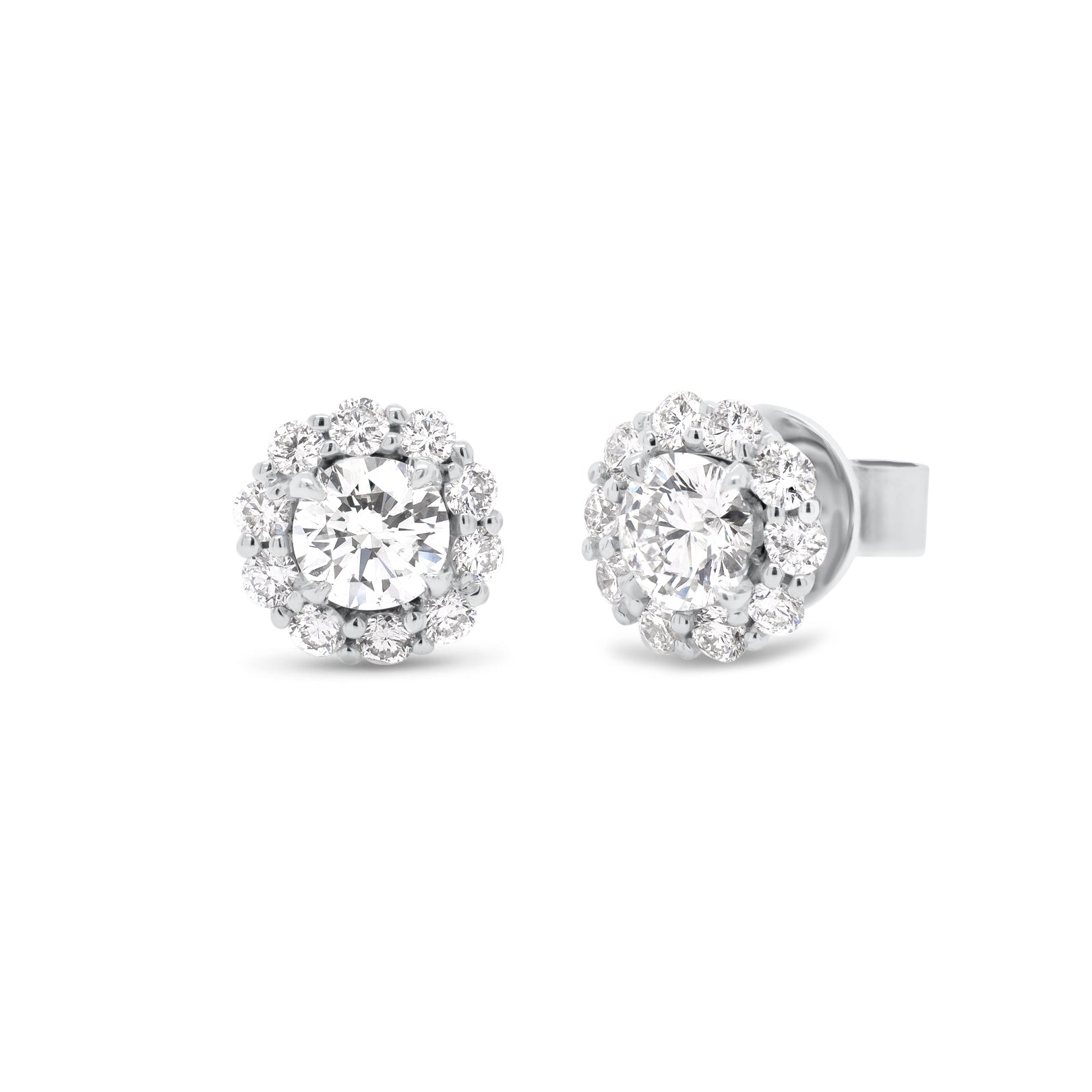 diamond halo stud earrings - 18K gold weighing 2.95 grams  - 20 round diamonds totaling 0.51 carats  - 2 round diamonds totaling 0.78 carats