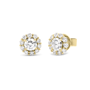 diamond halo stud earrings - 18K gold weighing 2.95 grams - 20 round diamonds totaling 0.51 carats - 2 round diamonds totaling 0.78 carats