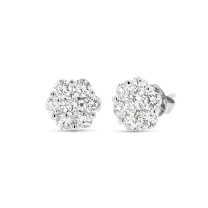 Diamond cluster stud earrings - 18K gold weighing 2.86 grams  - 2 round diamonds totaling 0.52 carats  - 12 round diamonds totaling 1.76 carats