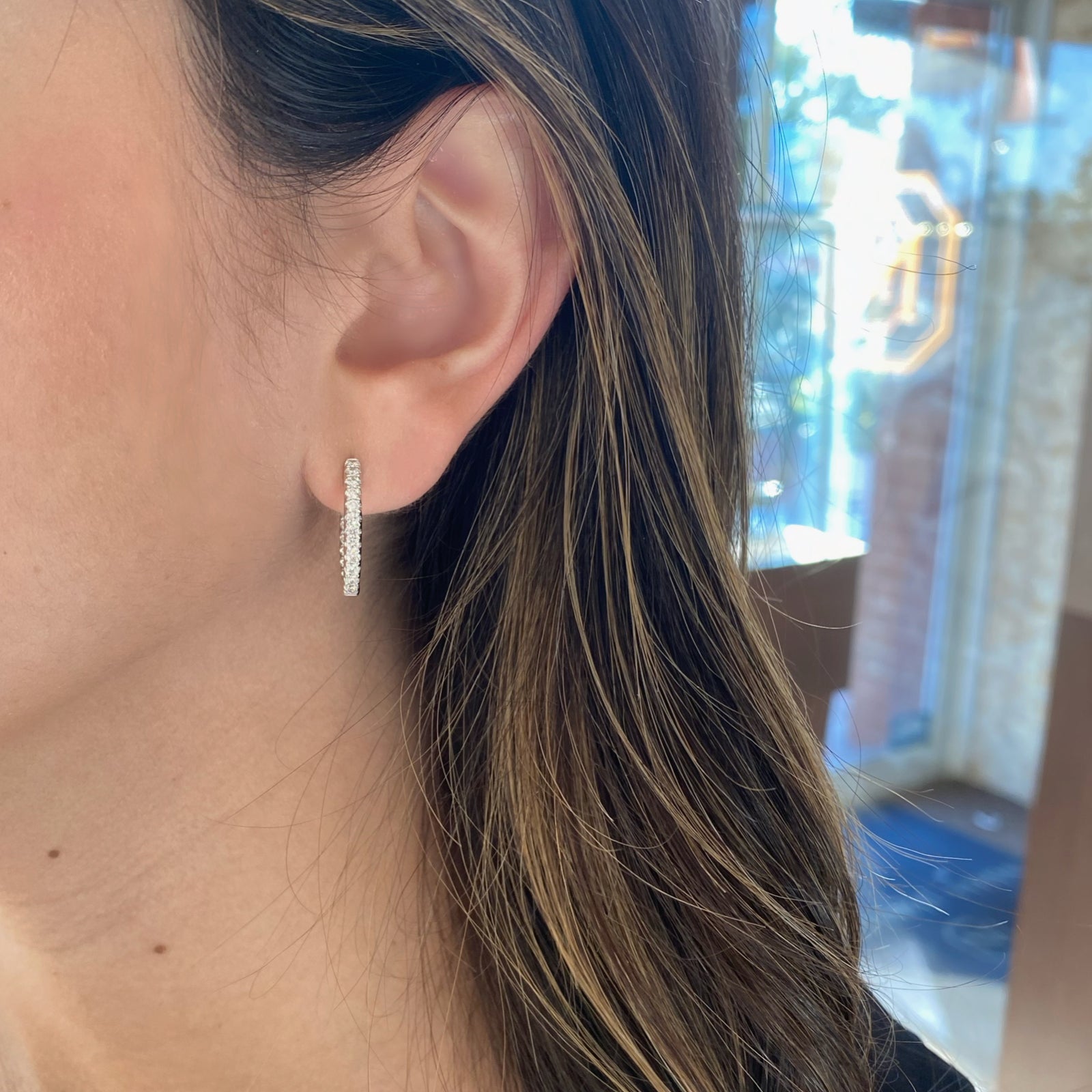 18K gold weighing 4.49 grams featuring 44 round diamonds weighing 0.98 carats iamond Interior & Exterior Huggie Earrings | Nuha Jewelers