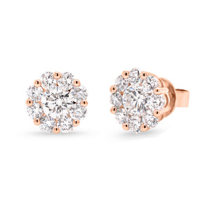 diamond halo stud earrings  -18K gold weighing 3.30 grams  -2 round brilliant-cut diamonds totaling 0.95 carats (GIA-graded F-G color, SI1 clarity)  -16 round diamonds totaling 1.28 carats