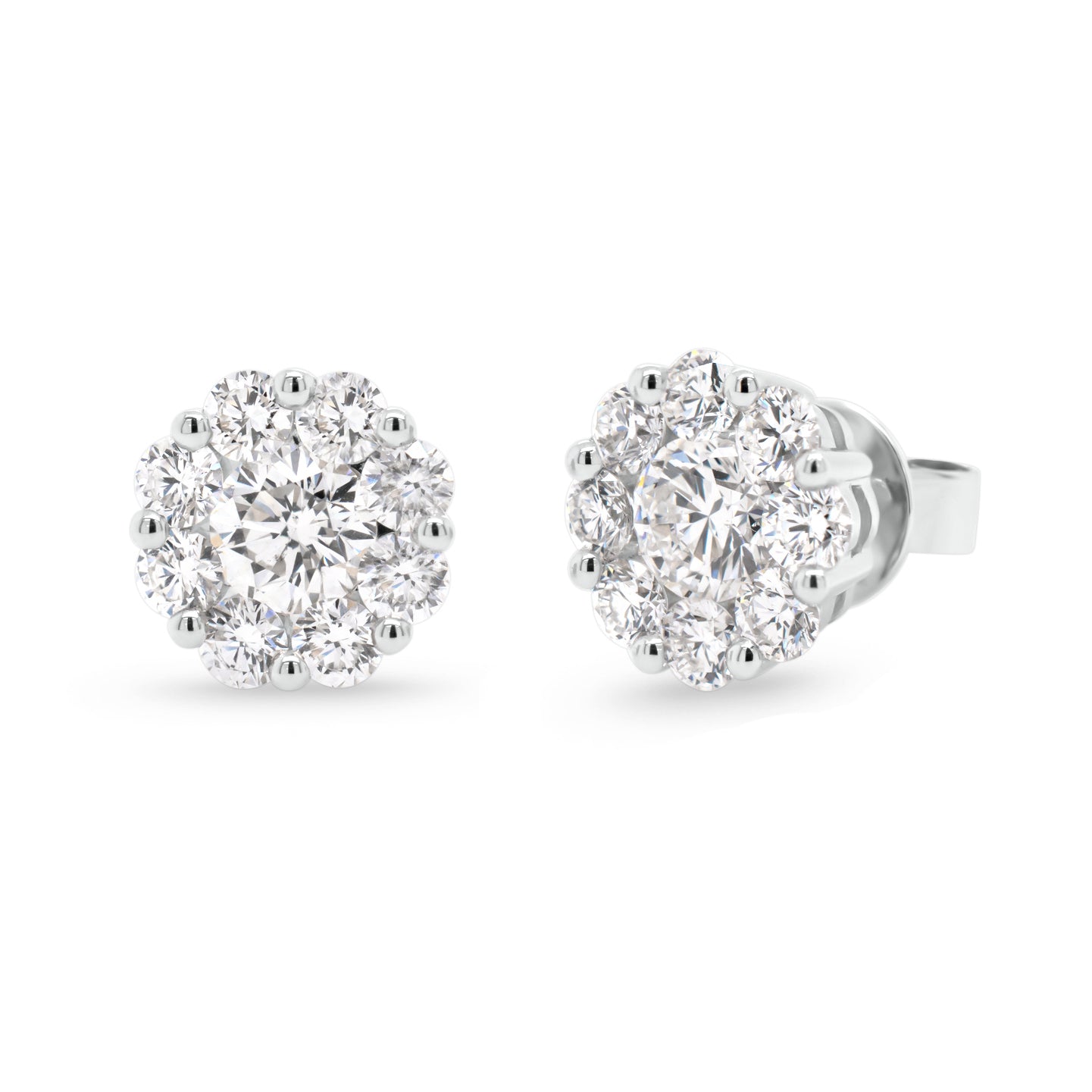 diamond halo stud earrings  -18K gold weighing 3.30 grams  -2 round brilliant-cut diamonds totaling 0.95 carats (GIA-graded F-G color, SI1 clarity)  -16 round diamonds totaling 1.28 carats