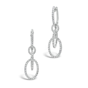 Diamond Two-Tone Dangle Earrings   -18K gold weighing 4.09 grams  -134 round diamonds totaling 0.69 carats