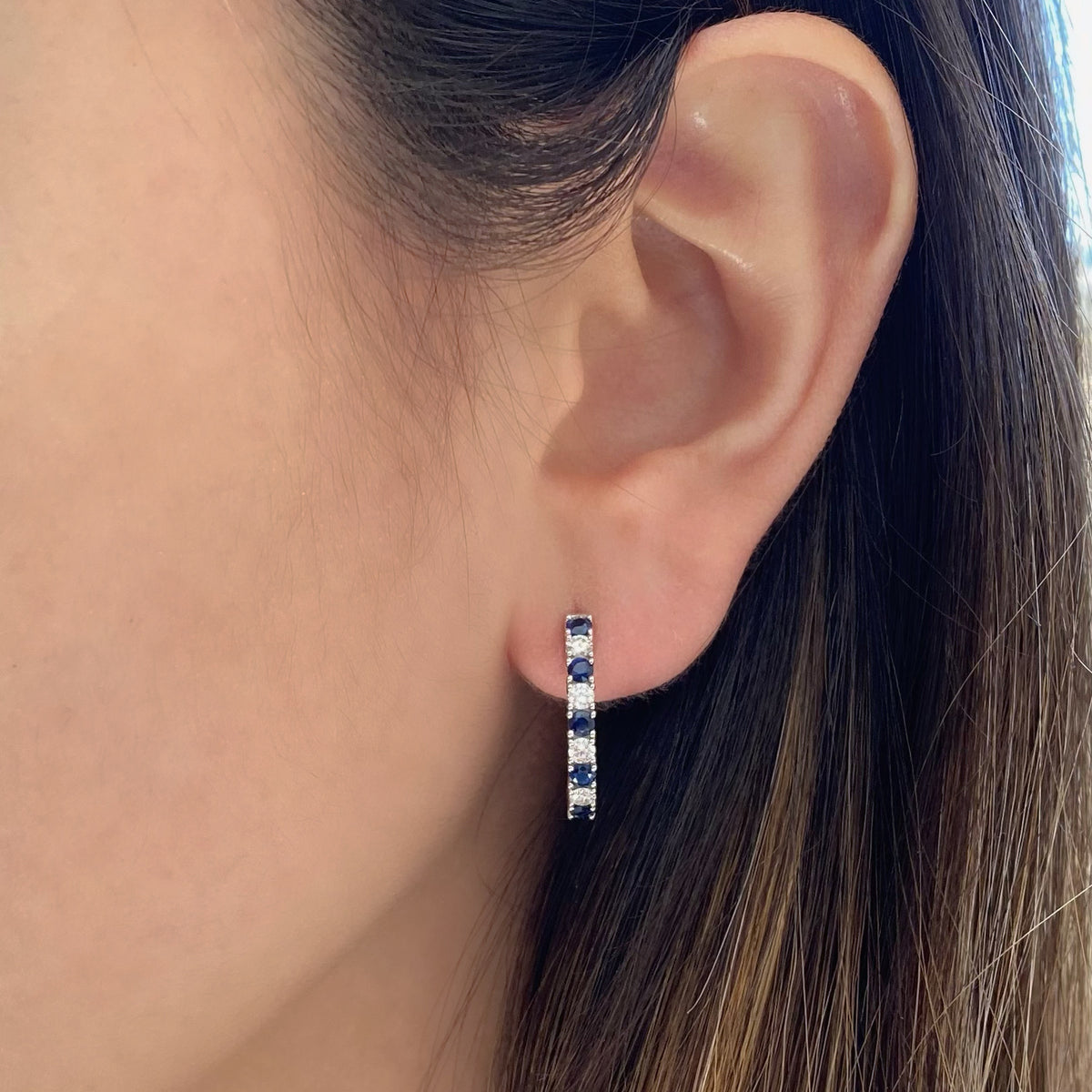 Sapphire & diamond huggie earrings - 18K gold weighing 4.31 grams  - 10 sapphires totaling 0.66 carats  - 8 round diamonds totaling 0.40 carats