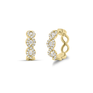 Diamond Twist hoop earrings - 18K gold weighing 5.83 grams  - 6 round diamonds totaling 0.30 carats  - 54 round diamonds totaling 0.50 carats