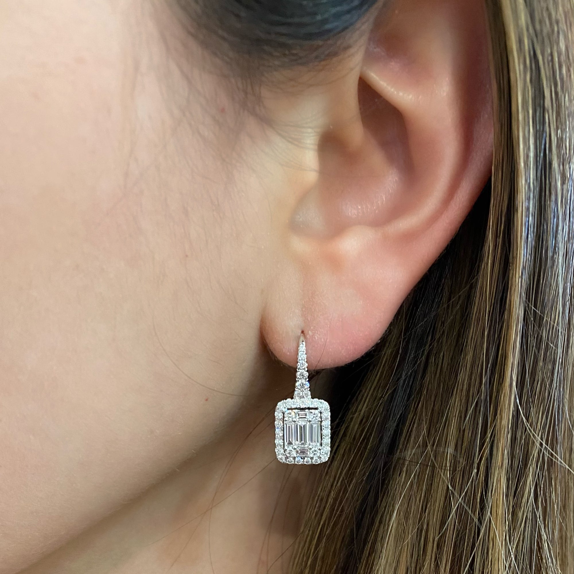 Baguette Diamond Lever-Back Earrings  - 18K gold weighing 4.05 grams  - 2 slim baguettes totaling 0.40 carats  - 8 slim baguettes totaling 0.52 carats  - 66 round diamonds totaling 0.71 carats  - Total carat weight 1.63 carats