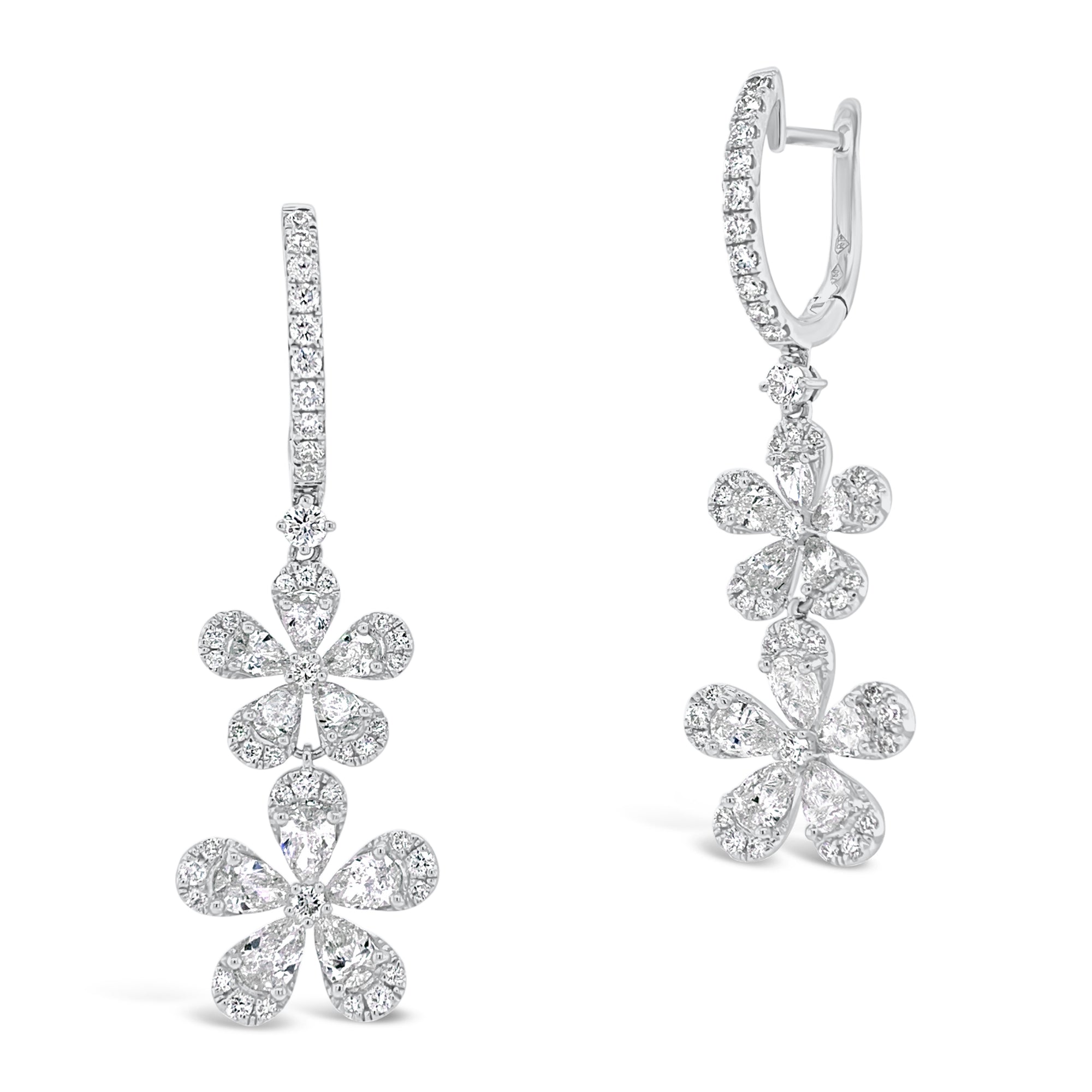 Diamond Double Flower Drop Earrings  -18K gold weighing 7.02 grams  -86 round diamonds totaling 0.87 carats  -20 Pear shape prong-set diamonds totaling 2.33 carats 
