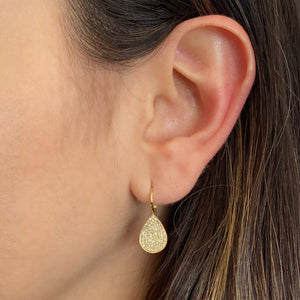 Female Model Wearing Pave Diamond Teardrop Lever-Back Earrings  - 14K gold weighing 2.09 grams  - 160 round diamonds totaling 0.42 carats