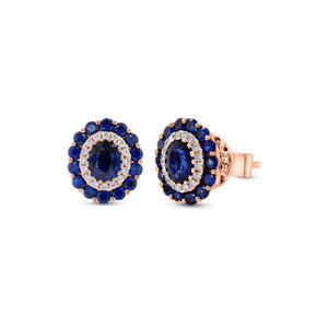 sapphire & diamond oval stud earrings - 18K gold weighing 2.98 grams  - 2 oval-shaped sapphires totaling 0.79 carats  - 28 round sapphires totaling 0.73 carats  - 32 round diamonds totaling 0.12 carats