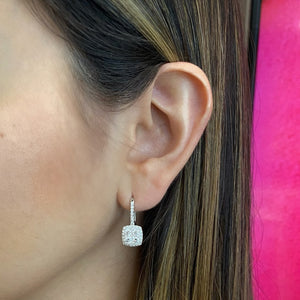 Female Model Wearing Diamond Cushion Drop Lever-Back Earrings  -18K gold weighing 3.92 grams  -72 round brilliant-cut diamonds in a four-prong micro setting totaling 1.63 carats.