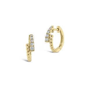 Diamond & Beaded Gold Crossover Huggie Earrings -18K yellow gold weighing 2.87 grams  -10 round diamonds totaling 0.19 carats