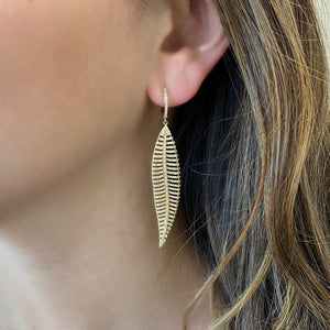 Female Model Wearing Diamond Leaf Earrings  14k gold, 8.74 grams, 572 round pave-set diamonds, 1.36 carats.